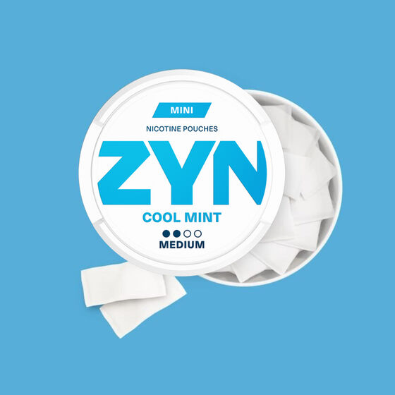 ZYN COOL MINT - an open, light blue nicotine pouch can with 2 pouches next to it